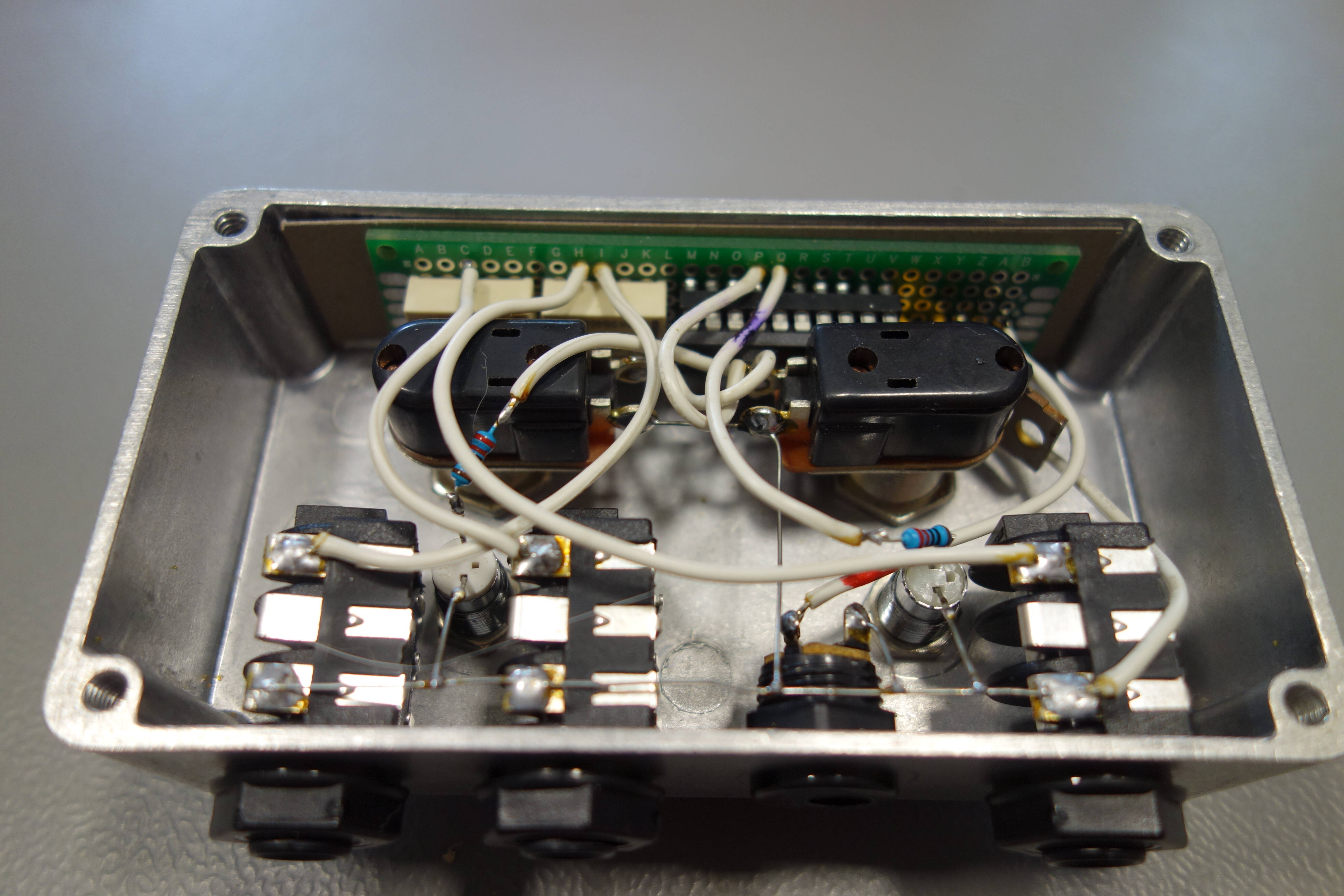 Momentary latching switch