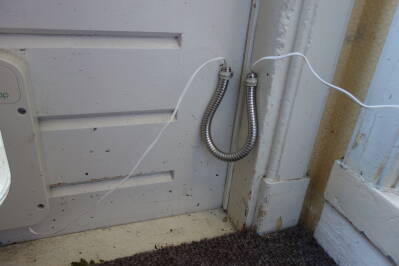 Shower hose door loop with door closed