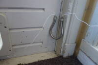 Shower hose door loop with door closed